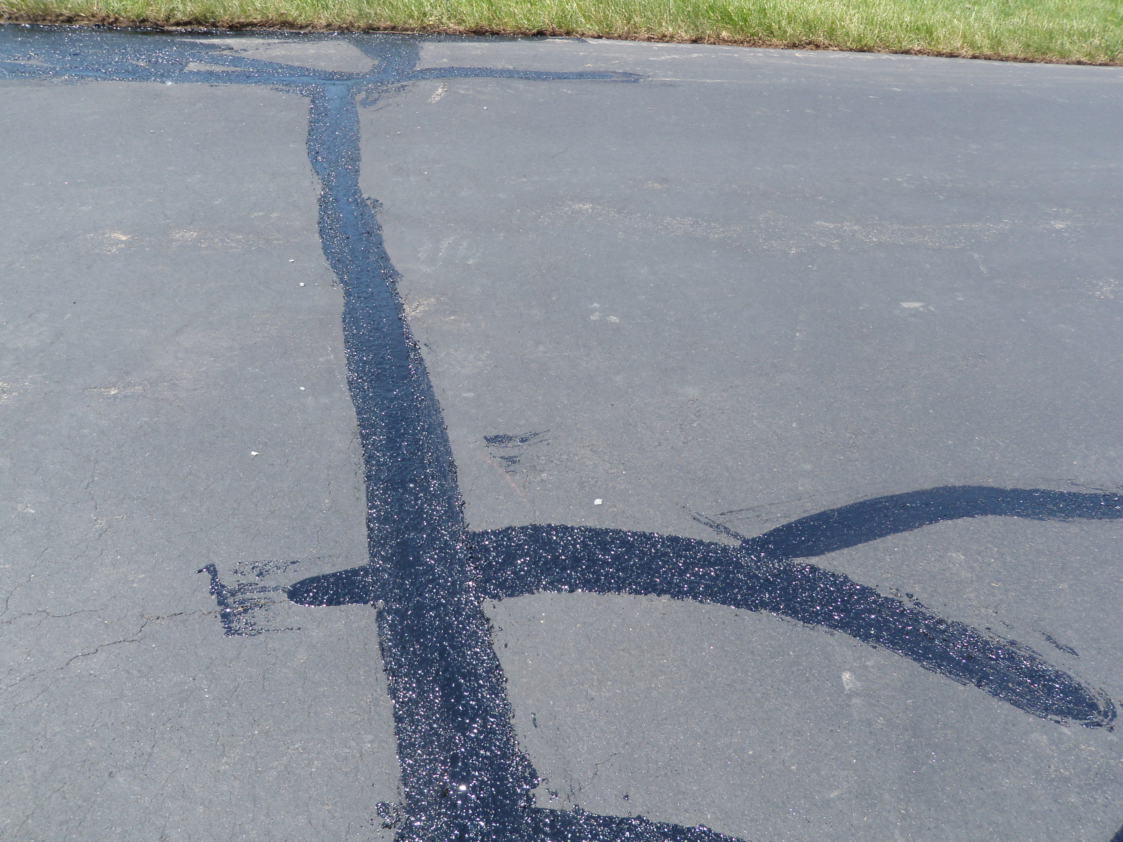 Crack Sealing Process for Driveway 2