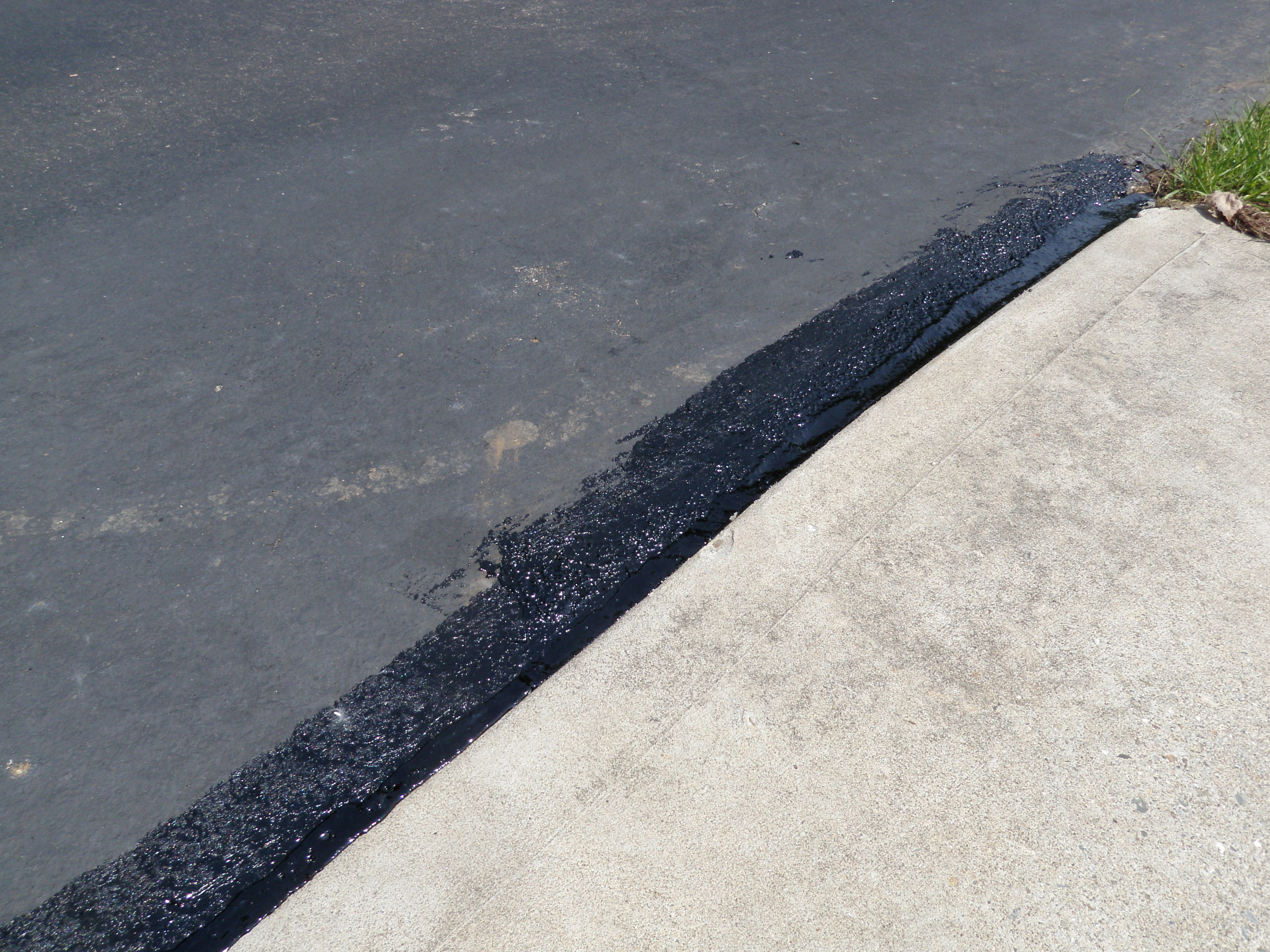 Driveway Sealant Application by Road