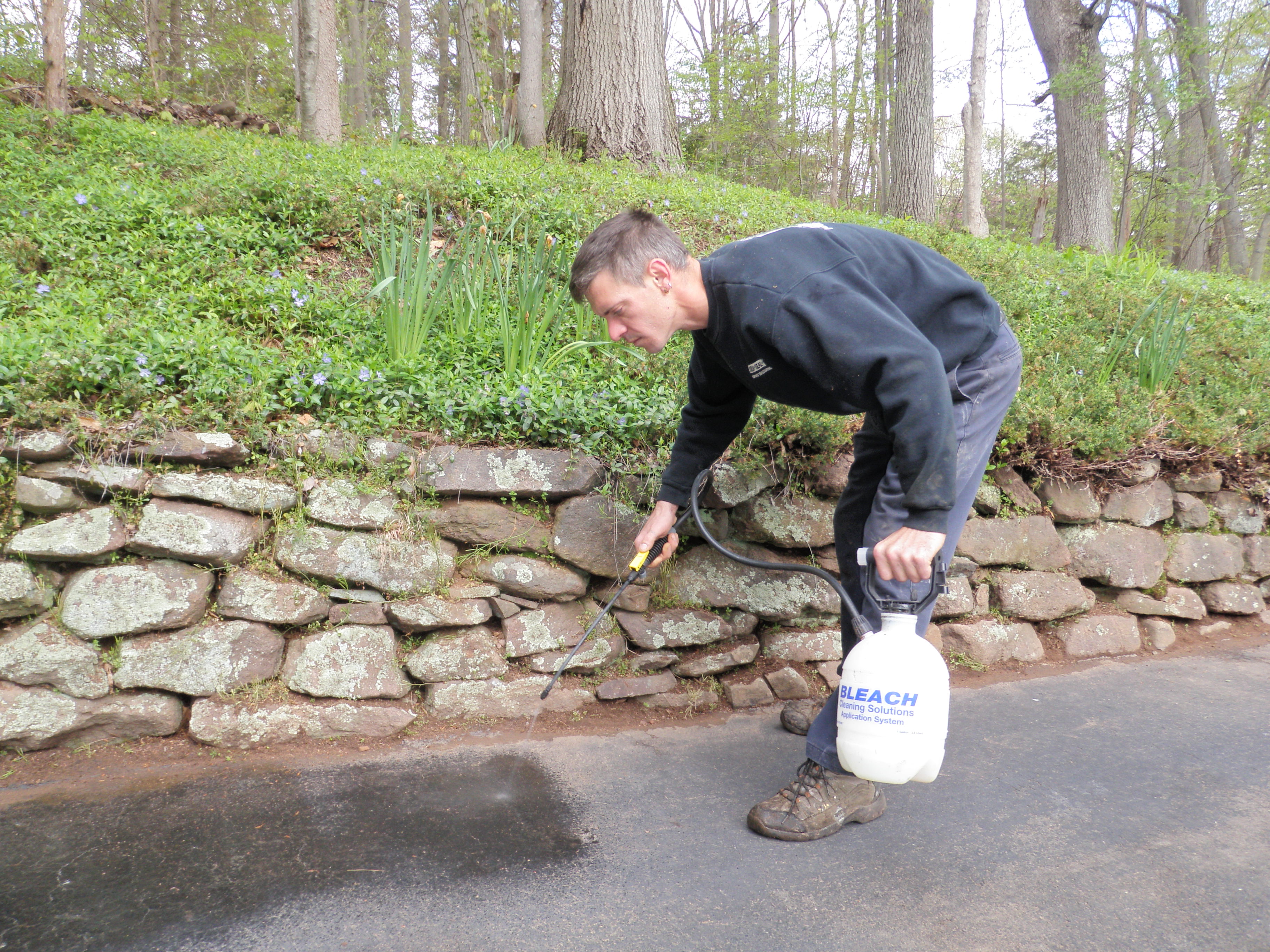 Sprying Driveway Before Application
