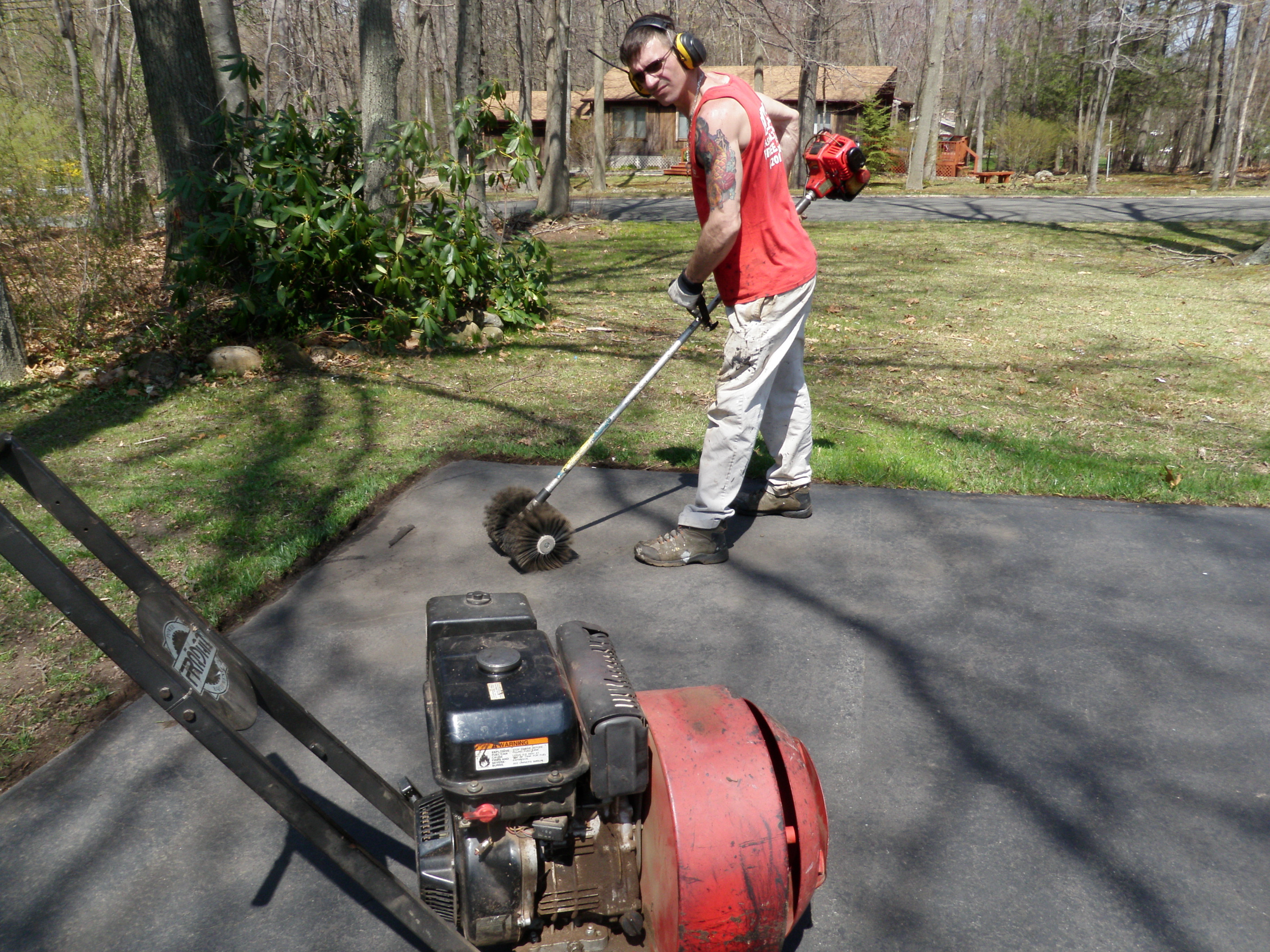 Brushing and Blowing Off Driveway